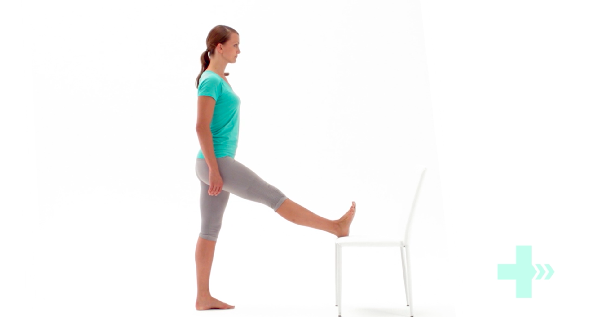woman performing hamstring stretch